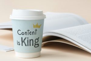 Kaffee Becher mit der Aufschrift Content is King